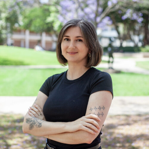 Photo of Jordan Galczynski, wearing a black shirt in an outdoor setting.
