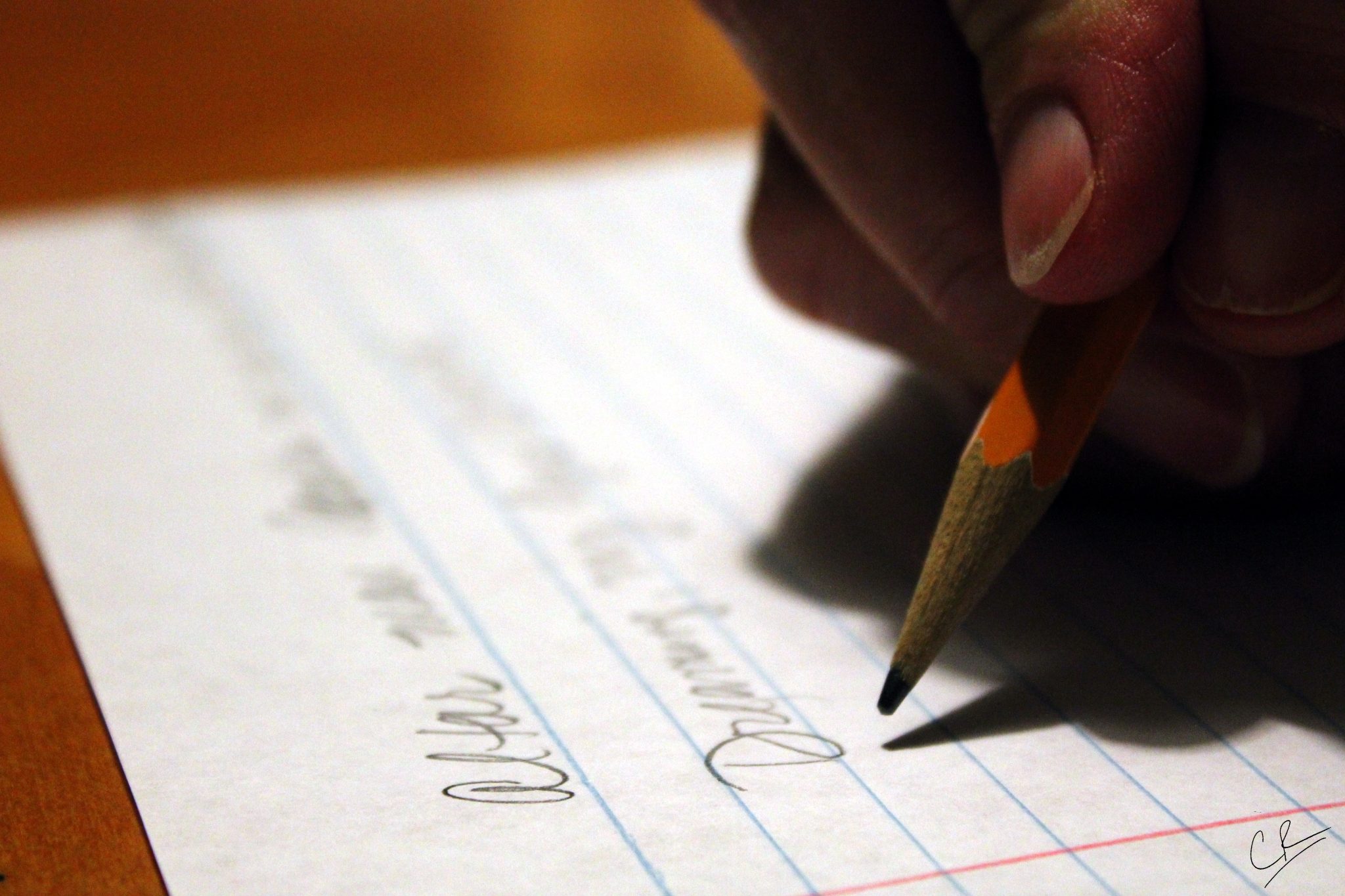 handwriting with a pencil on paper